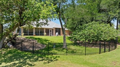Gorgeous - fantastic drive up appeal and outstanding fairway on Pecan Plantation Country Club in Texas - for sale on GolfHomes.com, golf home, golf lot