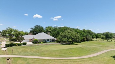 Gorgeous - fantastic drive up appeal and outstanding fairway on Pecan Plantation Country Club in Texas - for sale on GolfHomes.com, golf home, golf lot