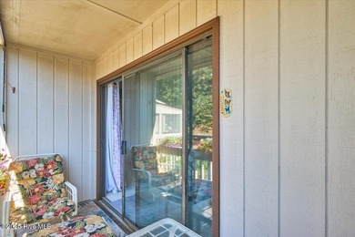 Don't miss this golf front condo with golf and WATER views on a on Whispering Woods in North Carolina - for sale on GolfHomes.com, golf home, golf lot