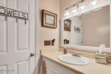 Don't miss this golf front condo with golf and WATER views on a on Whispering Woods in North Carolina - for sale on GolfHomes.com, golf home, golf lot