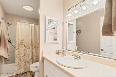 Don't miss this golf front condo with golf and WATER views on a on Whispering Woods in North Carolina - for sale on GolfHomes.com, golf home, golf lot