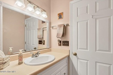 Don't miss this golf front condo with golf and WATER views on a on Whispering Woods in North Carolina - for sale on GolfHomes.com, golf home, golf lot