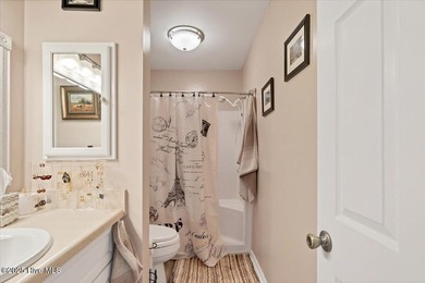 Don't miss this golf front condo with golf and WATER views on a on Whispering Woods in North Carolina - for sale on GolfHomes.com, golf home, golf lot