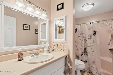 Don't miss this golf front condo with golf and WATER views on a on Whispering Woods in North Carolina - for sale on GolfHomes.com, golf home, golf lot