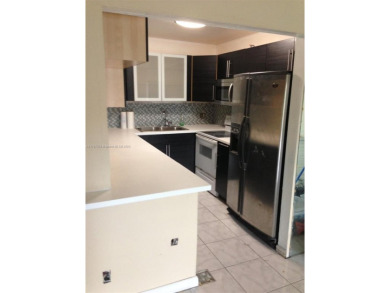 beautifully upgraded 1-bedroom, 2-bathroom condo nestled on the on Inverrary Country Club in Florida - for sale on GolfHomes.com, golf home, golf lot
