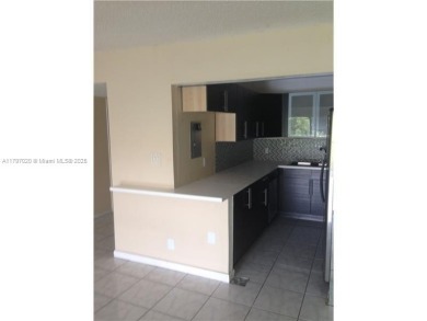 beautifully upgraded 1-bedroom, 2-bathroom condo nestled on the on Inverrary Country Club in Florida - for sale on GolfHomes.com, golf home, golf lot