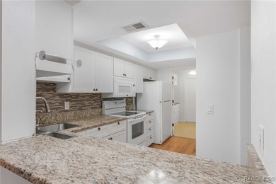 Lock in your living expenses in this care-free condo that on Citrus Hills Golf Club in Florida - for sale on GolfHomes.com, golf home, golf lot