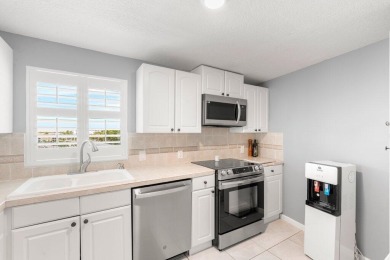 Experience the best of coastal living at 155 Yacht Club Drive on North Palm Beach Country Club in Florida - for sale on GolfHomes.com, golf home, golf lot
