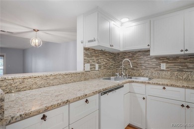 Lock in your living expenses in this care-free condo that on Citrus Hills Golf Club in Florida - for sale on GolfHomes.com, golf home, golf lot