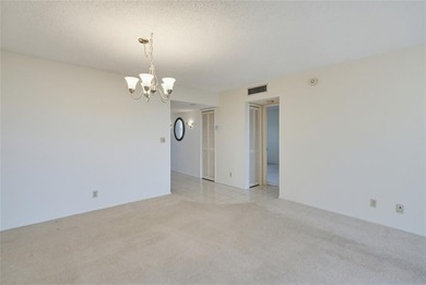 Lovely, bright and super well-maintained two bedroom two bath on Palm-Aire Country Club and Resort - The Oaks in Florida - for sale on GolfHomes.com, golf home, golf lot