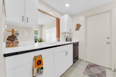 Peace of mind comes built- in with this beautifully maintained on Leisureville Community Association in Florida - for sale on GolfHomes.com, golf home, golf lot