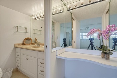 Lovely, bright and super well-maintained two bedroom two bath on Palm-Aire Country Club and Resort - The Oaks in Florida - for sale on GolfHomes.com, golf home, golf lot