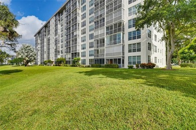Lovely, bright and super well-maintained two bedroom two bath on Palm-Aire Country Club and Resort - The Oaks in Florida - for sale on GolfHomes.com, golf home, golf lot