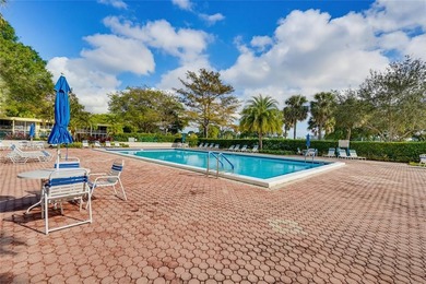 Lovely, bright and super well-maintained two bedroom two bath on Palm-Aire Country Club and Resort - The Oaks in Florida - for sale on GolfHomes.com, golf home, golf lot