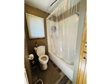 Close to Stockton Lake, Golf Course, and Town - This Home Has It on Stockton Country Club in Missouri - for sale on GolfHomes.com, golf home, golf lot