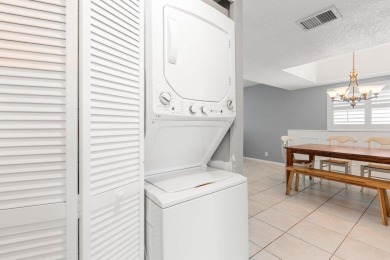 Experience the best of coastal living at 155 Yacht Club Drive on North Palm Beach Country Club in Florida - for sale on GolfHomes.com, golf home, golf lot