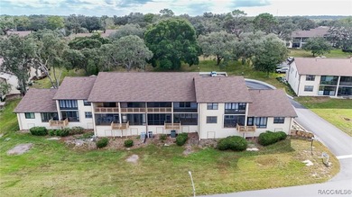 Lock in your living expenses in this care-free condo that on Citrus Hills Golf Club in Florida - for sale on GolfHomes.com, golf home, golf lot