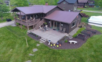 Beautiful, turn-key 4 bedroom, 2 bath lake view home located on on Atwood Lake Resort Golf Course in Ohio - for sale on GolfHomes.com, golf home, golf lot