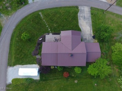 Beautiful, turn-key 4 bedroom, 2 bath lake view home located on on Atwood Lake Resort Golf Course in Ohio - for sale on GolfHomes.com, golf home, golf lot