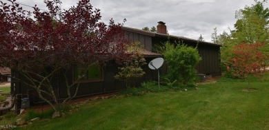 Beautiful, turn-key 4 bedroom, 2 bath lake view home located on on Atwood Lake Resort Golf Course in Ohio - for sale on GolfHomes.com, golf home, golf lot