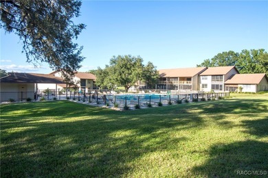 Lock in your living expenses in this care-free condo that on Citrus Hills Golf Club in Florida - for sale on GolfHomes.com, golf home, golf lot