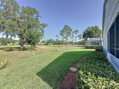 Very popular Canterbury model located on the 15th hole of the on Kings Ridge Golf Club in Florida - for sale on GolfHomes.com, golf home, golf lot