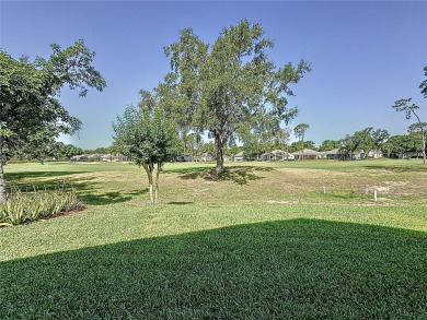 Very popular Canterbury model located on the 15th hole of the on Kings Ridge Golf Club in Florida - for sale on GolfHomes.com, golf home, golf lot
