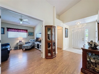 Very popular Canterbury model located on the 15th hole of the on Kings Ridge Golf Club in Florida - for sale on GolfHomes.com, golf home, golf lot