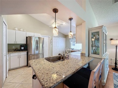 Very popular Canterbury model located on the 15th hole of the on Kings Ridge Golf Club in Florida - for sale on GolfHomes.com, golf home, golf lot