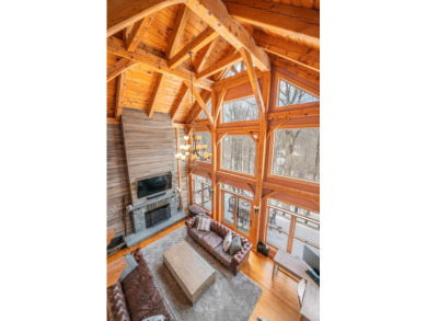 Enjoy perfect Vermont styling in this inspiring timber frame on Mount Snow Golf Club in Vermont - for sale on GolfHomes.com, golf home, golf lot