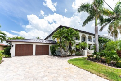 ABSOLUTELY STUNNING CUSTOM WATERFRONT HOME offers fabulous long on Saint Andrews South Golf Club in Florida - for sale on GolfHomes.com, golf home, golf lot