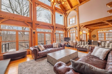 Enjoy perfect Vermont styling in this inspiring timber frame on Mount Snow Golf Club in Vermont - for sale on GolfHomes.com, golf home, golf lot