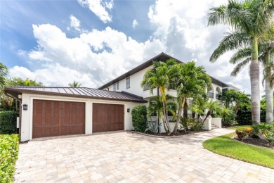 ABSOLUTELY STUNNING CUSTOM WATERFRONT HOME offers fabulous long on Saint Andrews South Golf Club in Florida - for sale on GolfHomes.com, golf home, golf lot