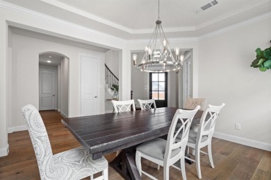 Built in 2021, this stunning 5-bedroom, 4.5-bath white brick on Lantana Golf Club in Texas - for sale on GolfHomes.com, golf home, golf lot