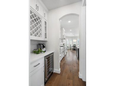Built in 2021, this stunning 5-bedroom, 4.5-bath white brick on Lantana Golf Club in Texas - for sale on GolfHomes.com, golf home, golf lot