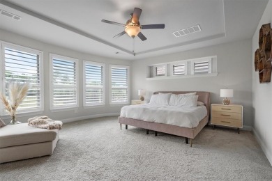 Built in 2021, this stunning 5-bedroom, 4.5-bath white brick on Lantana Golf Club in Texas - for sale on GolfHomes.com, golf home, golf lot