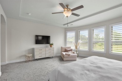 Built in 2021, this stunning 5-bedroom, 4.5-bath white brick on Lantana Golf Club in Texas - for sale on GolfHomes.com, golf home, golf lot