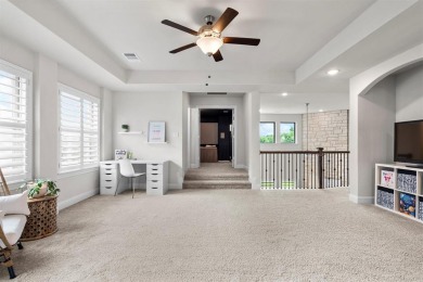 Built in 2021, this stunning 5-bedroom, 4.5-bath white brick on Lantana Golf Club in Texas - for sale on GolfHomes.com, golf home, golf lot