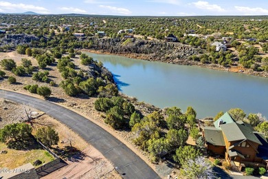 Prime Waterfront Opportunity - Nestled directly on the serene on Silver Creek Golf Club in Arizona - for sale on GolfHomes.com, golf home, golf lot