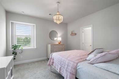 Built in 2021, this stunning 5-bedroom, 4.5-bath white brick on Lantana Golf Club in Texas - for sale on GolfHomes.com, golf home, golf lot