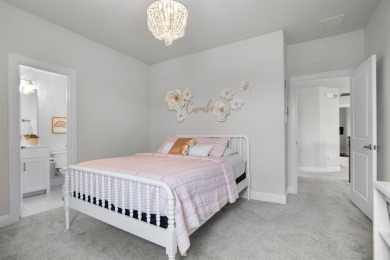 Built in 2021, this stunning 5-bedroom, 4.5-bath white brick on Lantana Golf Club in Texas - for sale on GolfHomes.com, golf home, golf lot