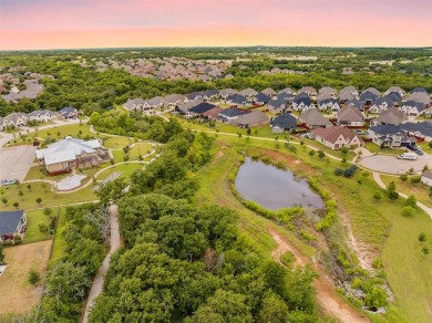 Built in 2021, this stunning 5-bedroom, 4.5-bath white brick on Lantana Golf Club in Texas - for sale on GolfHomes.com, golf home, golf lot