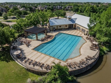 Built in 2021, this stunning 5-bedroom, 4.5-bath white brick on Lantana Golf Club in Texas - for sale on GolfHomes.com, golf home, golf lot