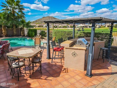 Located in the highly sought-after Estates at Johnson Ranch and on The Golf Club At Johnson Ranch in Arizona - for sale on GolfHomes.com, golf home, golf lot