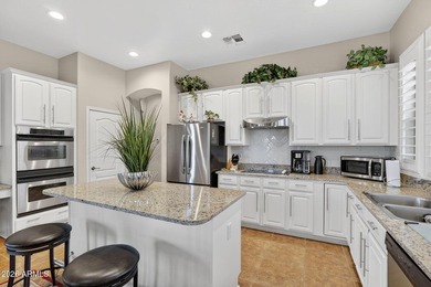 Located in the highly sought-after Estates at Johnson Ranch and on The Golf Club At Johnson Ranch in Arizona - for sale on GolfHomes.com, golf home, golf lot