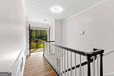 Discover this beautifully maintained brick 4-bedroom, 2.5-bath on Canongate At Flat Creek Club in Georgia - for sale on GolfHomes.com, golf home, golf lot