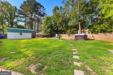 Discover this beautifully maintained brick 4-bedroom, 2.5-bath on Canongate At Flat Creek Club in Georgia - for sale on GolfHomes.com, golf home, golf lot
