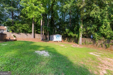 Discover this beautifully maintained brick 4-bedroom, 2.5-bath on Canongate At Flat Creek Club in Georgia - for sale on GolfHomes.com, golf home, golf lot