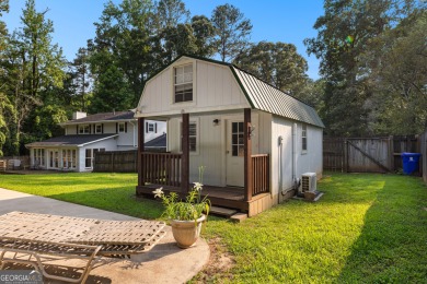 Discover this beautifully maintained brick 4-bedroom, 2.5-bath on Canongate At Flat Creek Club in Georgia - for sale on GolfHomes.com, golf home, golf lot