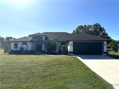 Custom built FIVE bedroom THREE bath home connected to central on Copperhead Golf Club in Florida - for sale on GolfHomes.com, golf home, golf lot